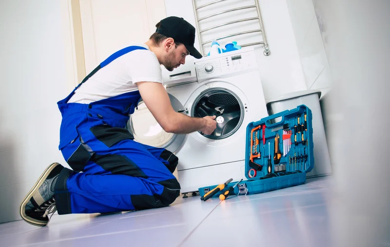 Professional washer repair service with tools and technician. Professional washer repair service with tools and technician.